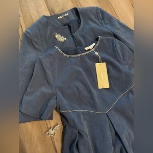 Elegant Blue Dress with Embellished Neckline and Matching Blazer and Broaches